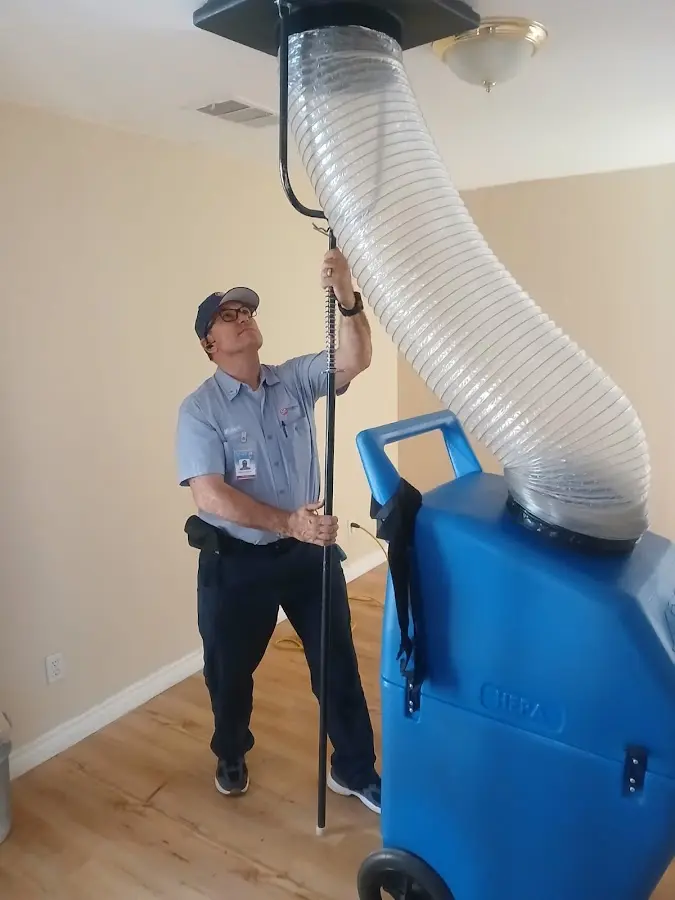 HVAC Installation technician using HEPA equipment in El Campo